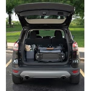 Image of wagon folded on its side in trunk of a car