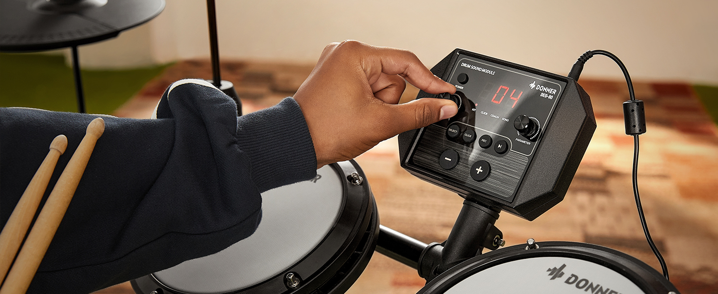 Donner DED-80 Electronic Drum Set,Electric Drum Set for Beginner with 4 Quiet Mesh Drum Pads,2 Switch Pedal,180+ Sounds,Throne,On-Ear Headphones,Sticks,and Melodics Lessons Included. Donner DED-80 Electronic Drum Set,Electric Drum Set for Beginner with 4 Quiet Mesh Drum Pads,2 Switch Pedal,180+ Sounds,Throne,On-Ear Headphones,Sticks,and Melodics Lessons Included.